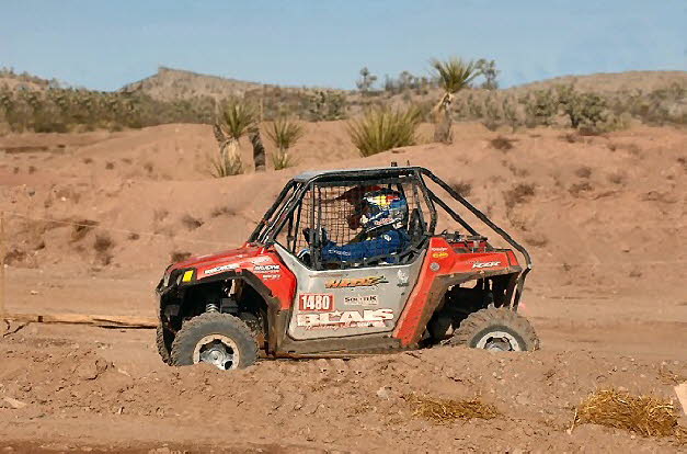 Chris moving out in his Rzr at the 2009 Searchlight GP