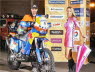 Chris at the start of the Dakar Rally with Anne Grider in pink